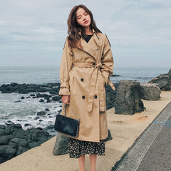 Stylish slim autumn over-the-knee coat
