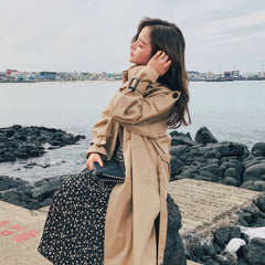 Stylish slim autumn over-the-knee coat