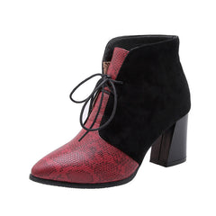 Pointy snakeskin lace-up boots