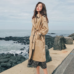 Stylish slim autumn over-the-knee coat