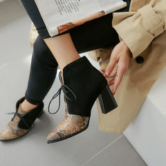 Pointy snakeskin lace-up boots