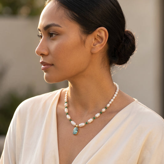 Freshwater pearl necklace with abalone shell pendant